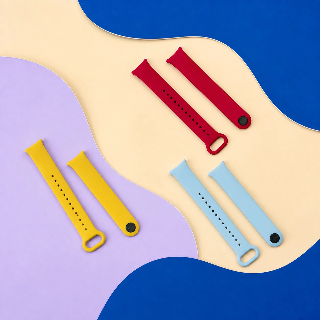 مقایسه رنگ بندهای سیلیکونی Xiaomi Mi Band 8 سه بند سیلیکونی دو تکه Mi Band 8 به رنگ قرمز زرد و آبی روشن