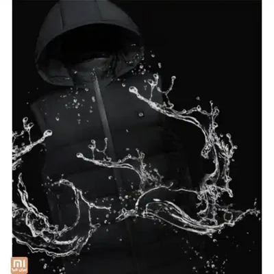 نمای مقاومت سطح جلیقه گرمکن Xiaomi PMA در برابر پاشش آب جلیقه گرم کن مشکی PMA شیائومی میان پاشش قطرات آب