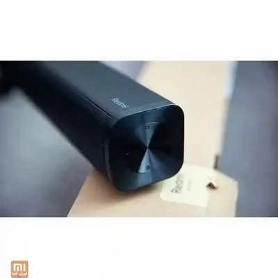ساندبار شیائومی مدل MDZ-34-DA؛ جزئیات پنل کناری Redmi ساندبار شیائومی مدل MDZ-34-DA از نمای نزدیک با کنترلهای انتهای بدنه