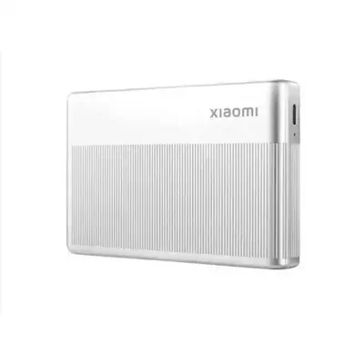 نمای کامل پرینتر Xiaomi 1S MJKDDYJ02HT پرینتر عکس قابل حمل نقرهای شیائومی 1S MJKDDYJ02HT با بدنه شیاردار