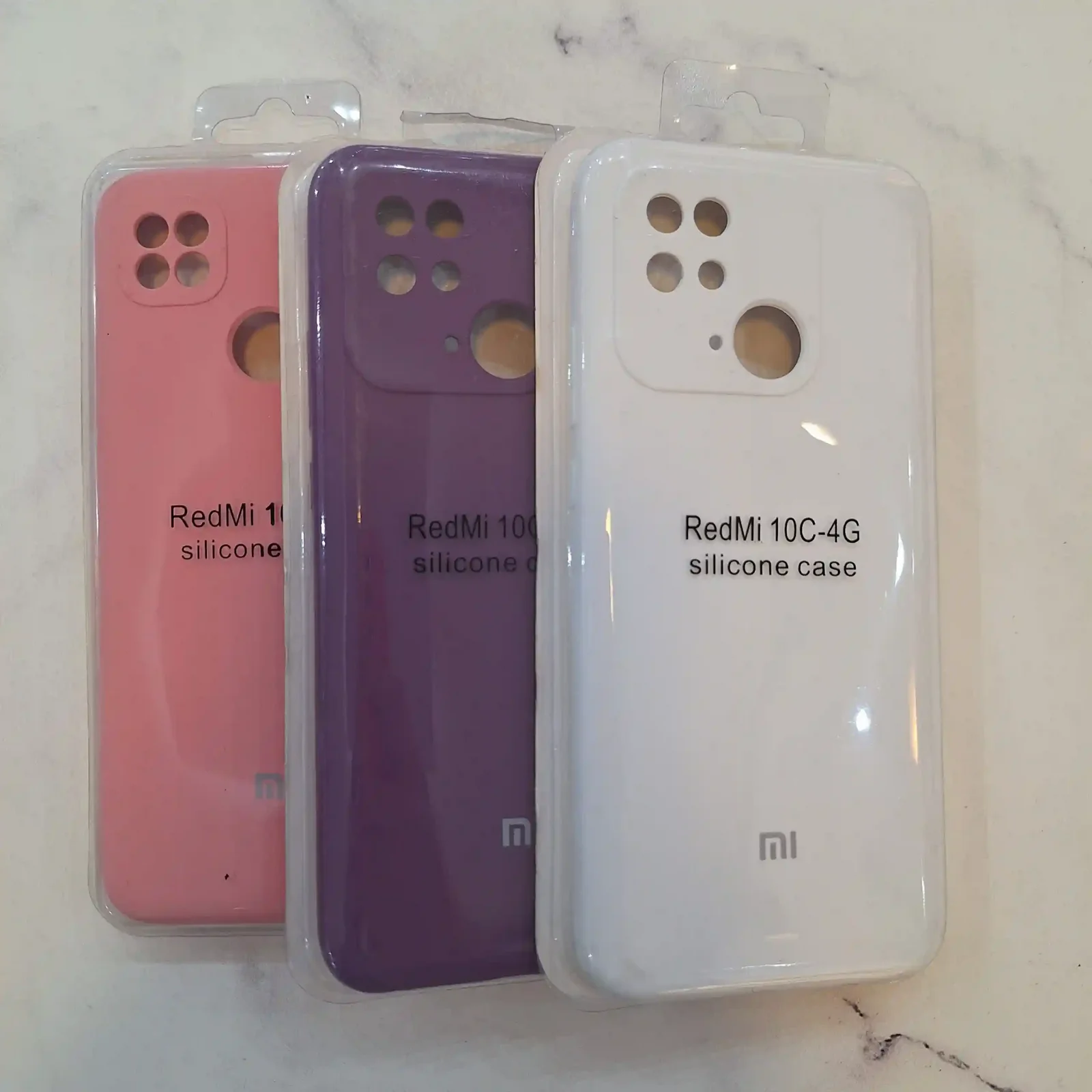 رنگ بندی قاب اورجینال ردمی 10C 4G داخل بسته بندی کاور سیلیکونی Redmi 10C 4G در رنگ های صورتی بنفش و سفید